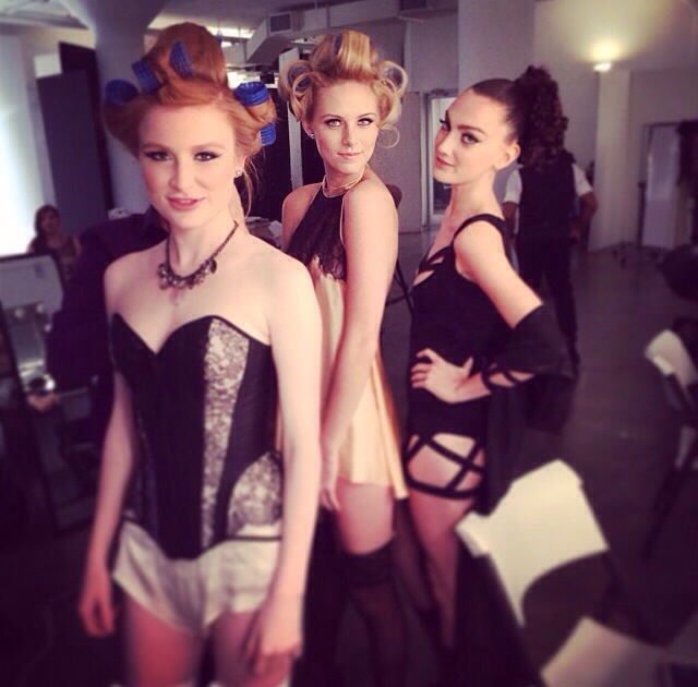 models backstage at oribe hair event styled in innerwear as outerwear