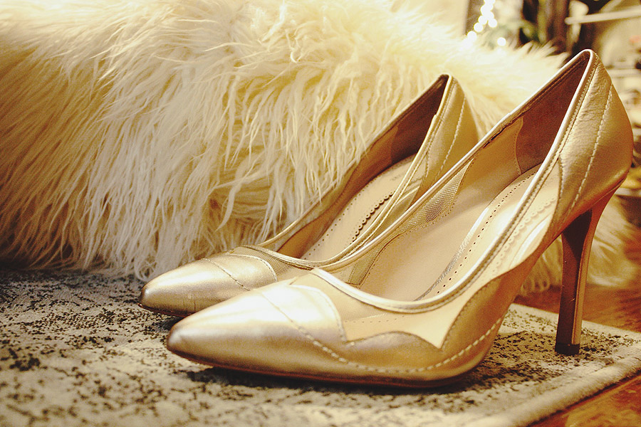 deco details of Layla & Josh's NYC New Year's Eve city hall  winter wedding - scallop gold heels