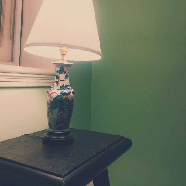 lovely bedside lamps and antique details at catherine harnden house