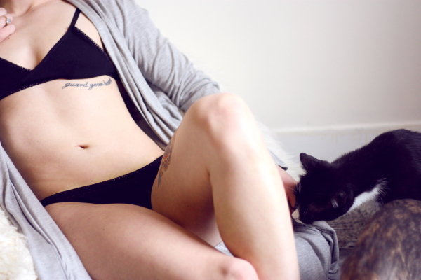 casey - tattood beauty in lingerie w/ kittenon shag pouf on BTS blog