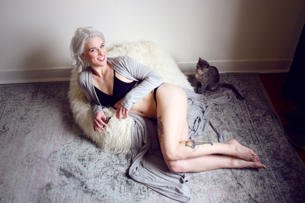 casey - tattood beauty w/ kitten lingerie on persian rug/mongolian pouf on BTS blog