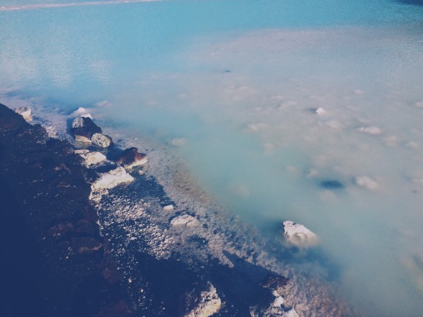 the unique crystal blue water of blue lagoon - between the sheets iceland travel tips